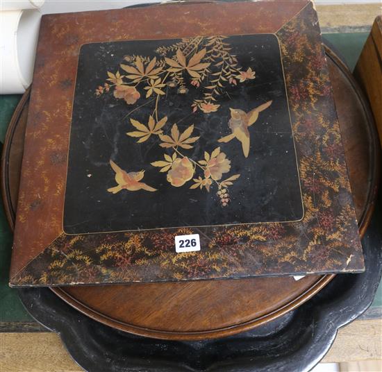 Three various trays and an inlaid panel